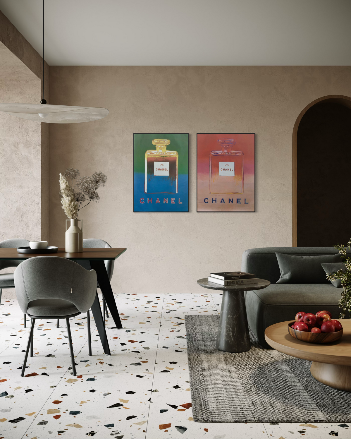Blue and pink Andy Warhol Chanel No. 5 posters displayed side by side as a diptych in a home interior