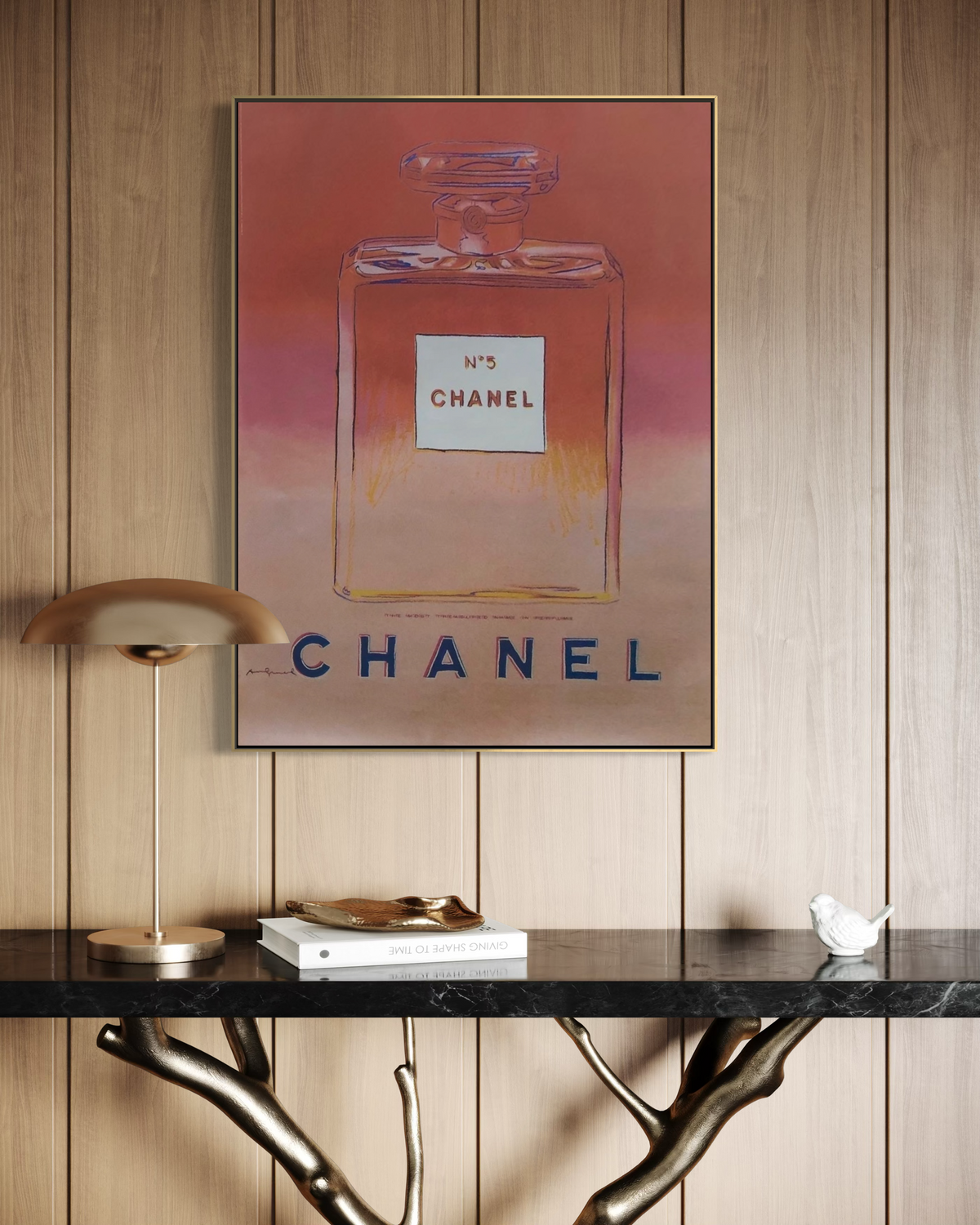 Andy Warhol pink Chanel No. 5 pop art poster hung on a wall