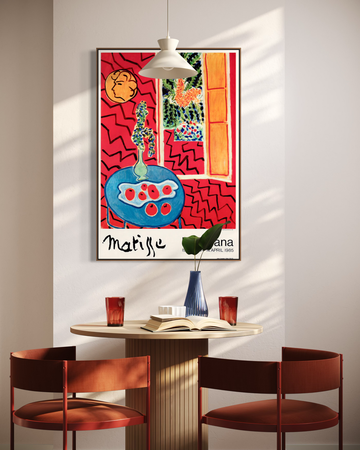 Henri Matisse exhibition poster hung on a wall alongside other art as a styling example